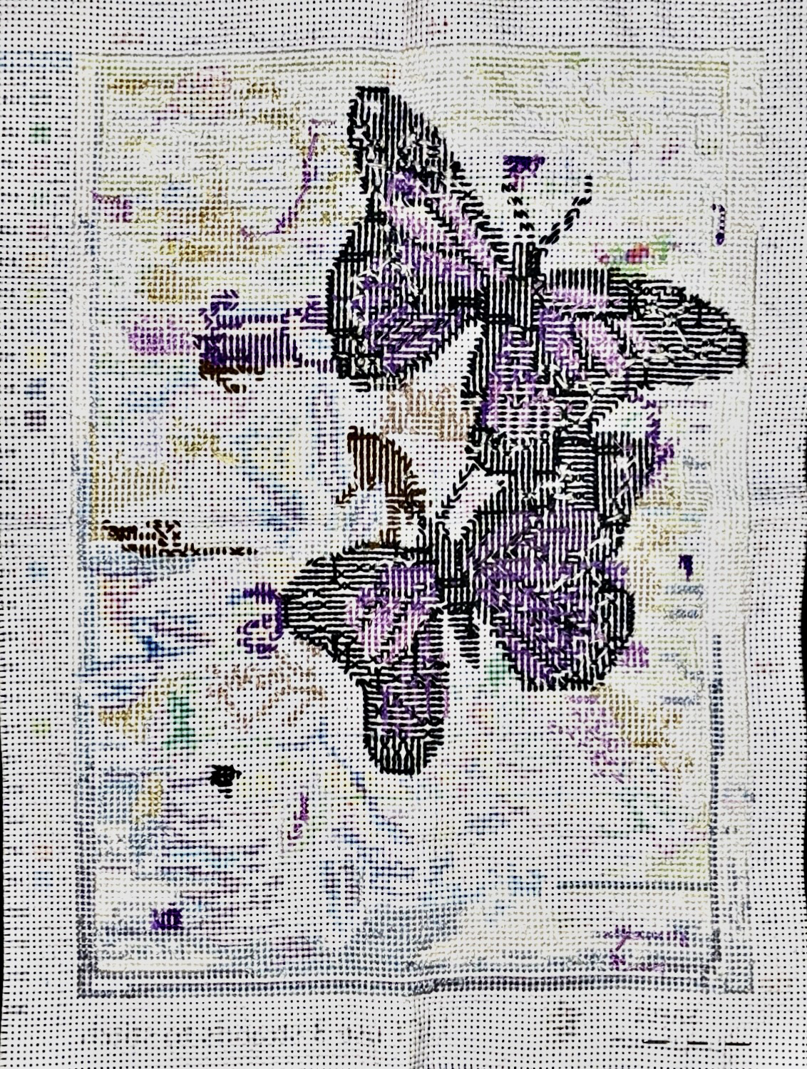 the backside of a stamped cross stitch pattern with two purple butterflies surrounded by unstitched flowers