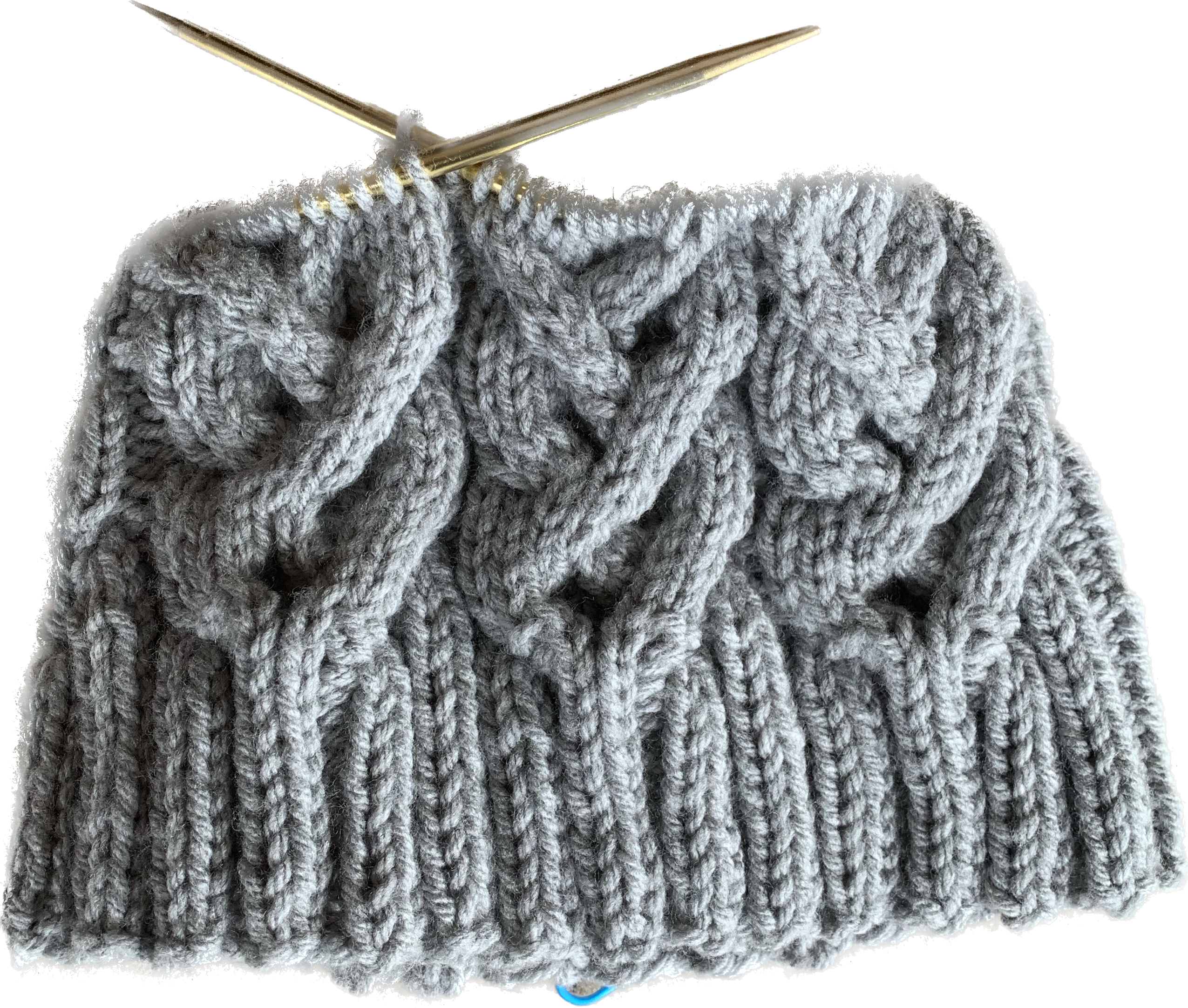 a gray knitted hat with cables