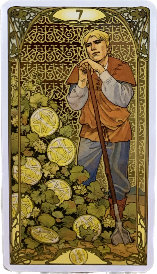 A man leans on his gardening tool and gazes at a garden filled with seven pentacles